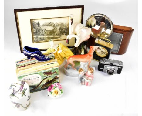 A collectors' lot comprising Brook Bond picture card albums, an Art Deco mantel clock, a Royal Doulton figure HN2315 The Last