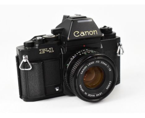 CANON; an F1 film camera, serial no.166953, fitted with a Canon 50mm 1:1.8 lens. CONDITION REPORT The camera body is in good 