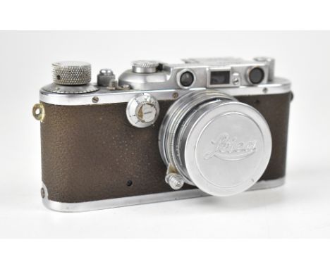 LEICA; an III camera, serial no.120931, fitted with a Summitar F=5cm 1:2 lens, fitted with a UV lens and a maker's cap, with 