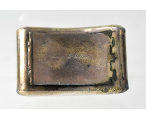 A Georgian silver snuff box of rectangular cushion form, the hinged lid engraved, 'James McMillan Norman', parcel gilt interi