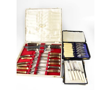 A cased 'Real Stag Horn' cutlery set by Lewis Rose &amp; Co Ltd, Sheffield, comprising carving knife, fork, steel and a set o