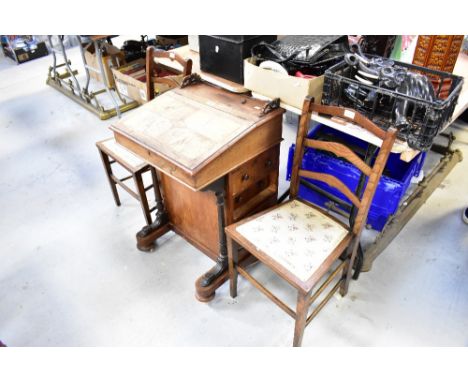 A mahogany Davenport for restoration and a pair of ladder back bedroom chairs raised on square section tapering stretchered s