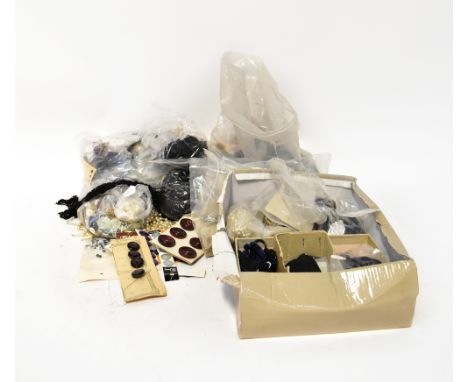 A large quantity of vintage buttons to include Victorian and Edwardian examples, mother of pearl buttons, linen examples, etc