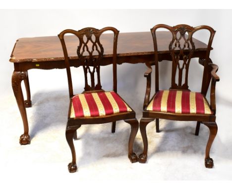 A reproduction Regency dining table with flame mahogany effect top, on cabriole ball and claw supports, length 184cm, togethe