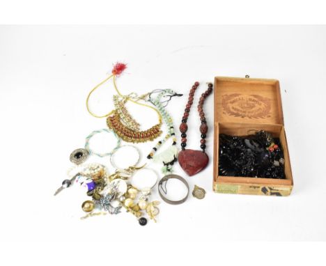 A quantity of costume and mourning jewellery to include jet beads, silver Christening bangle, earrings, Chinese hardstone nec