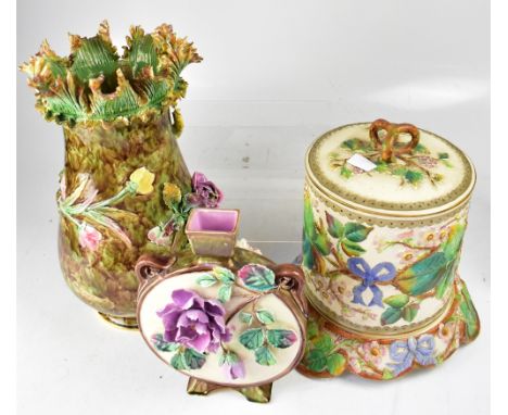 Three late 19th/early 20th century Continental Majolica items to include a large cheese dome with three loop branch handle to