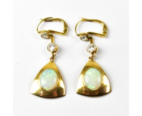 A pair of opal and diamond set earrings.