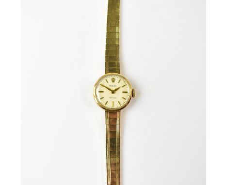 ROLEX; a ladies' vintage hallmarked 9ct gold manual wind Precision bracelet watch, the dial set with baton numerals, polished