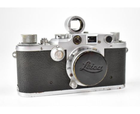 LEICA; an IIIc camera, serial no.400857, fitted with a Leitz Elmar F=5cm 1:3.5 lens, the camera fitted with a 5cm Leitz viewf