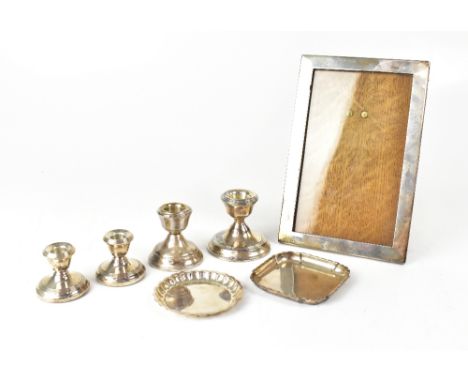 A small collection of hallmarked silverware to include a square pin dish, a circular scalloped pin dish, approx 2.9ozt, four 