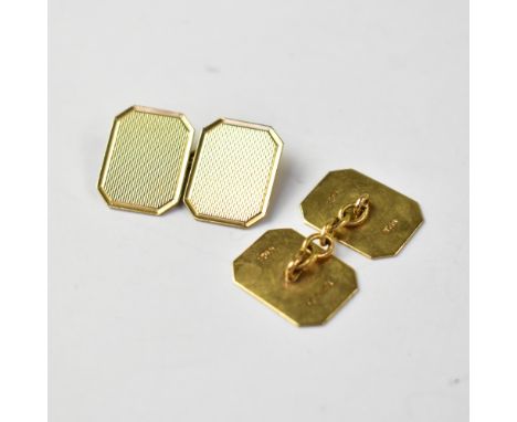 A pair of gentlemen's 9ct gold cufflinks, with engine turned square fronts and chamfered edges, united by gold chain, combine