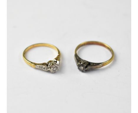 Two 18ct gold diamond solitaire rings comprising a ring with small diamond approx 0.03ct, in a platinum mount, size N, and a 