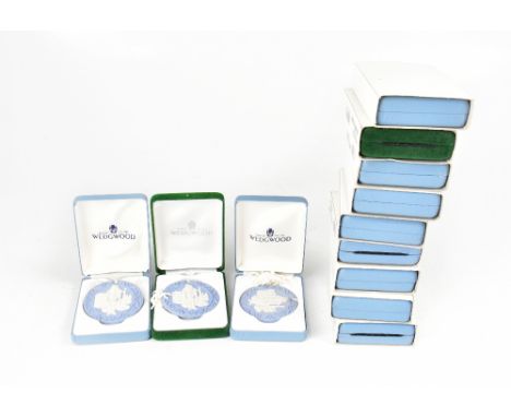 WEDGWOOD; twelve boxed pale blue Jasper ware Christmas decorations in the form of roundels, depicting scenes from the Nutcrac
