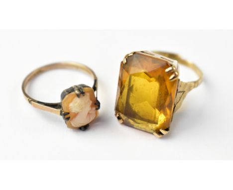 A 9ct gold dress ring with claw set facet cut citrine-style stone, on 9ct gold shank (cut), size H, together with a 9ct gold 