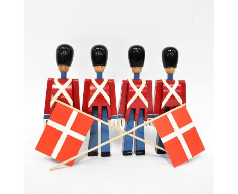 K BOJESEN FOR BANG &amp; OLUFSEN; four boxed promotional wooden toy soldiers, each with a paper Danish flag, height 23cm (4).