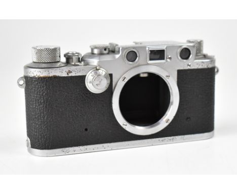 LEICA; an IIIc camera body, serial no.508775. CONDITION REPORT The camera has some pitting to the chrome, as well as light sc