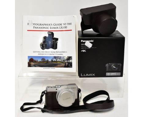 PANASONIC; a DMC-LX 100 digital camera fitted with a Leica DC Vario-Summilux 1:1.7-2.8/10.9-34 lens, with carry case, factory