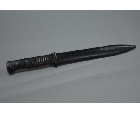 A WWII 3RD REICH GERMAN K98 RIFLE BAYONET, with the markings on the blade 951R, E.U.F. Horster, also the matching scabbard wh