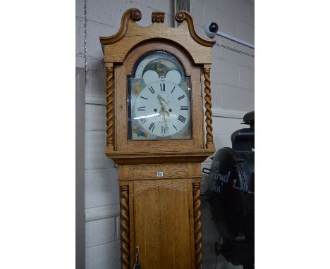 AN EARLY VICTORIAN PALE OAK LONGCASE CLOCK, broken swan neck pediment above barley twist columns, the arched 32cm 12 1/2'' pa