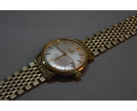 AN OMEGA AUTOMATIC SEAMASTER DE VILLE GENTS WRISTWATCH, gold plated, sweep seconds and date aperture