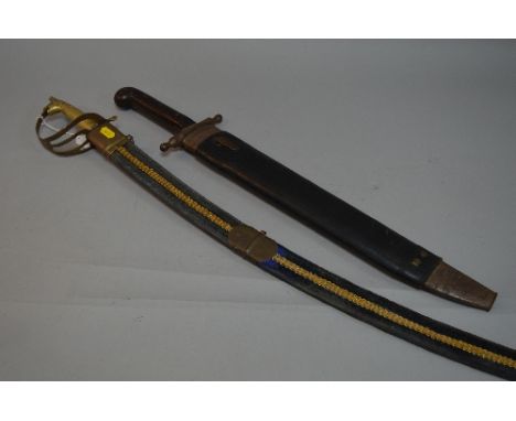 A LARGE CURVED STEEL SWORD IN SCABBARD, made in India, believed Tourist piece, a large steel blade machete and scabbard, hilt