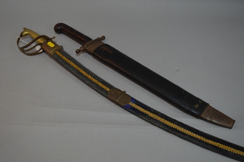 A LARGE CURVED STEEL SWORD IN SCABBARD, made in India, believed Tourist ...