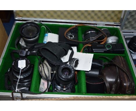 AN ALUMINIUM CASE OF MINOLTA CAMERAS AND EQUIPMENT, these include a 404Si fitted with a 28-80mm 1:3.5 lens, a 500si fitted wi