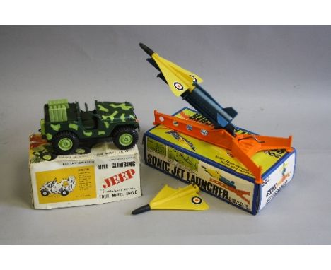 A BOXED MARX PLASTIC BATTERY OPERATED HILL CLIMBING JEEP, No.6131, not tested, some damage to windscreen, box complete but wo