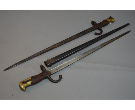 TWO FRENCH GRAS BAYONETS, 1874 pattern, one marked along top of blade Paris 1880, no scabbard, the hilt is stamped AG43233, t