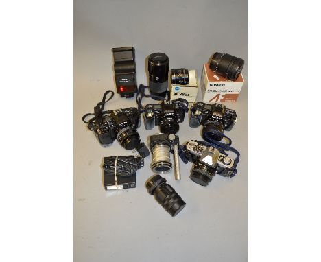 A BOX OF CAMERA EQUIPMENT, including two Minolta 7000, one with a 50mm the other with 35-70mm lens, a Minolta 9000 fitted wit