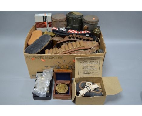 A DEALERS/TRADERS LARGE BOX CONTAINING A NUMBER OF MILITARY STYLE ITEMS, three cannisters for possibly German WWII gas masks,