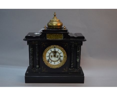 A LATE 19TH CENTURY ANSONIA OF NEW YORK BLACK SLATE MANTEL CLOCK OF ARCHITECTURAL FORM, brass dome above a classical frieze, 