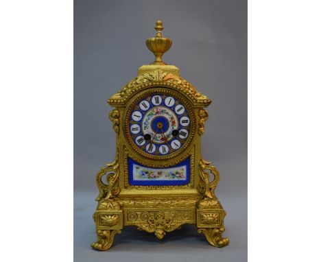 A LATE 19TH CENTURY JAPY FRERES AND HENRY MARC OF PARIS GILT METAL EIGHT DAY MANTEL CLOCK, urn finial on arched top above a c