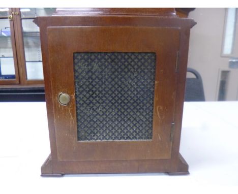 A MID 20TH CENTURY GARRARD MAHOGANY CASE BRACKET CLOCK, caddy top with brass carrying handle, silvered dial, Westminster chim