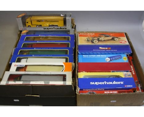 A QUANTITY OF BOXED MAINLY CORGI 1/64 SCALE TRUCKS, mainly from the Superhaulers range, with a boxed Solid State radio in the