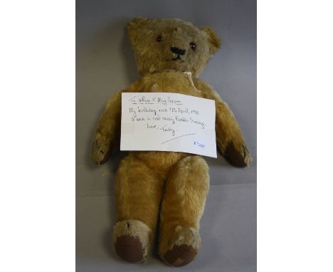 A 1930'S CHAD VALLEY GOLDEN PLUSH TEDDY BEAR, plastic eyes, horizontal stitched nose, three claws to each original cloth pads