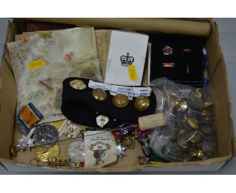 A BOX CONTAINING A NUMBER OF MEDALS AND MILITARY BADGES AND BUTTONS, PAPERWORK, etc, to include a ERII General Service medal 