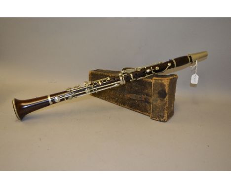 A ROSEWOOD CLARINET, made by E.J. Albert, Brussels and distributed by Lafleur and Sons, London, these stamps appear on the fo