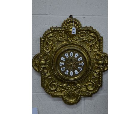 A LATE 19TH CENTURY CONTINENTAL WALL CLOCK, circular foliate embossed gilt metal 14.5cm dial with enamel Roman numerals, moun