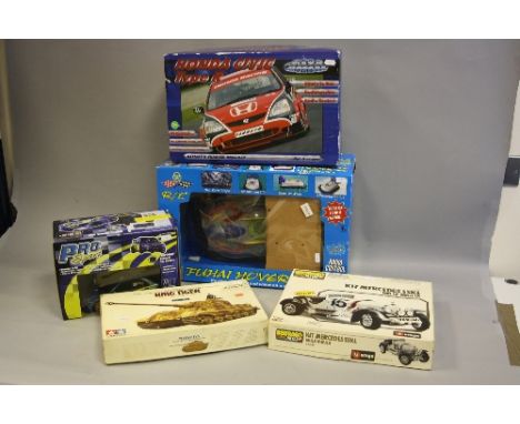 A COLLECTION OF TWO RADIO CONTROLLED CARS, 1 x Honda Civic, 1:11 scale and 1 x Subaru Pro Sport. Also in this Lot is a Fuhai 