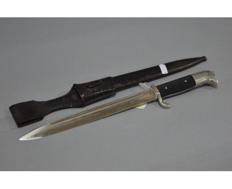 A GERMAN 3RD REICH WWII ERA K98 RIFLE BAYONET AND SCABBARD, (metal and leather frog), blade has the ASC and scale (coppel), m