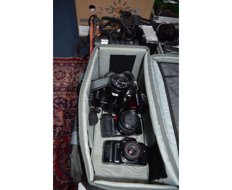 A BAG OF CAMERAS AND FLASHES, these include a Minolta 7000i with 35-80mm lens and 3200i flash, a Nikon F65 with a 28-80mm 1:3