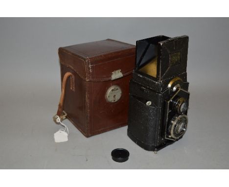 A ZEISS IKON IKOFLEX 'COFFEE CAN' TLR CAMERA, Serial No.4007568 impressed on the side of the lens, fitted with an Anastigmat 