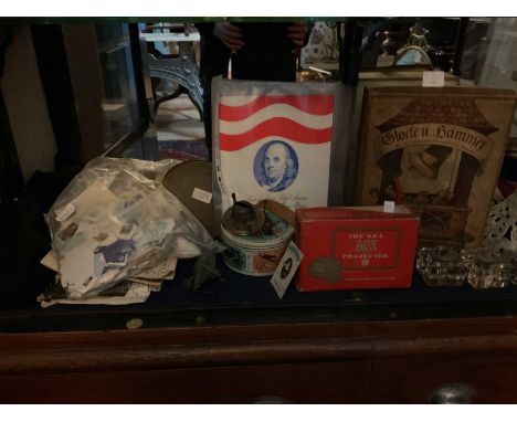 A small assortment of Victorian and later collectors' items, stamps, and ephemera, to include various weights, oil lamp bases