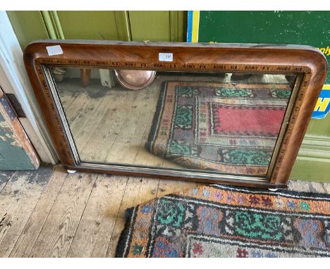 A Victorian inlaid rosewood overmantel mirror, terminating on ceramic castors, width 87cm, height 55cm.