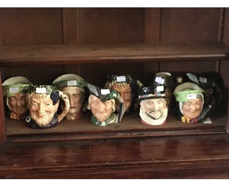 ROYAL DOULTON; seven large character jugs, including Robin Hood, Sairey Gamp, etc, with two further Toby jugs (9)Condition Re