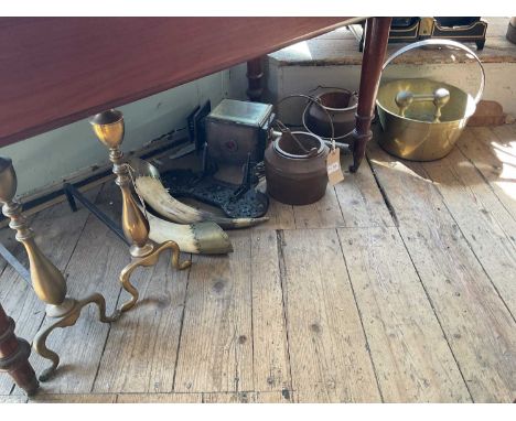 A quantity of metalware to include a pair of fire dogs, two brass mounted horns, a lantern and a gypsy pan.
