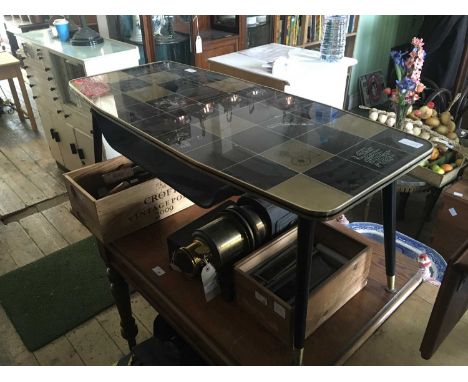 A reproduction drop-leaf yew wood coffee table of rectagular form, length 85cm, with a 1950s coffee table with undertier maga