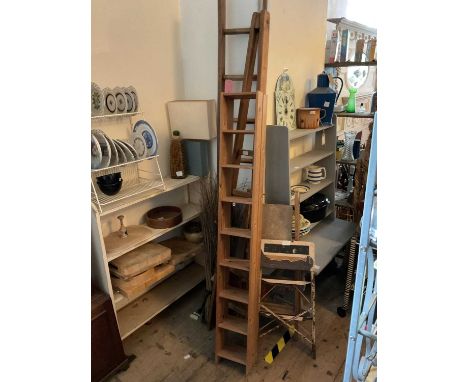 Two sets of step ladders and two sets of folding ladders (4).