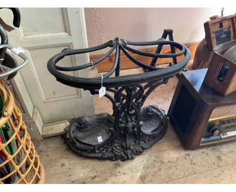 An Art Nouveau style cast metal stick stand.Condition Report: Appears in fair condition, some minor pitting throughout and so